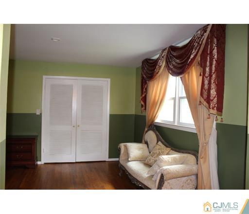 21 Chandler Road Edison, NJ 08820 - Photo 17 of 20 a living room with furniture and a window