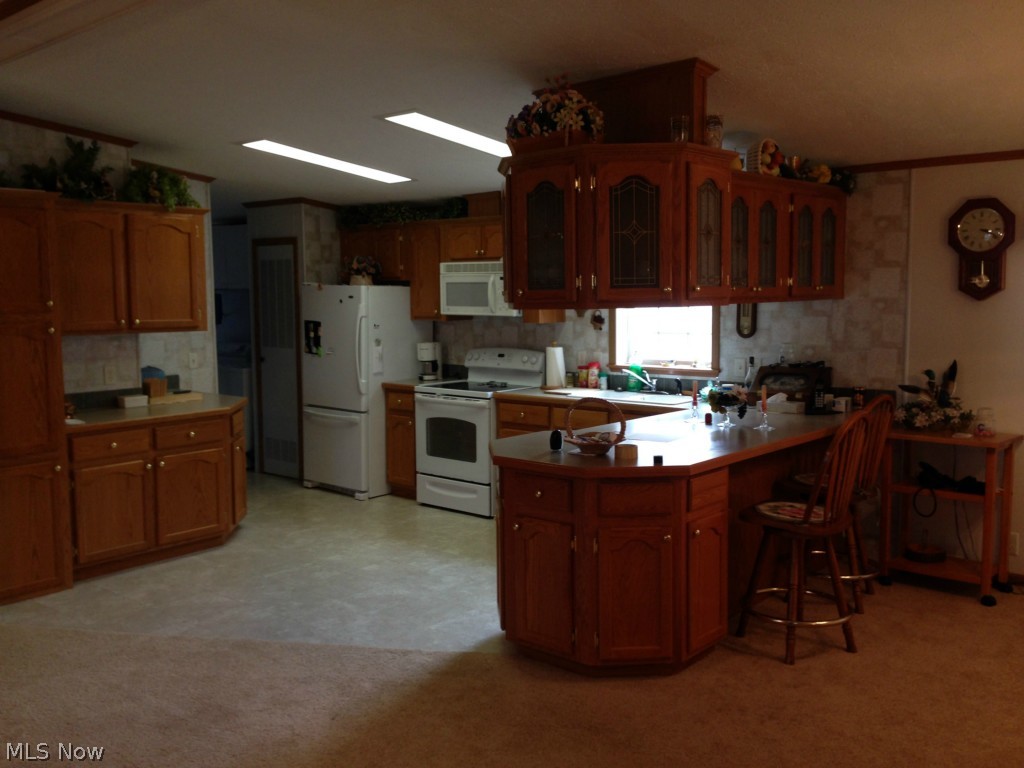 101 Morges Road Malvern, OH 44644 - Photo 17 of 18 Room for bar stools at the counter