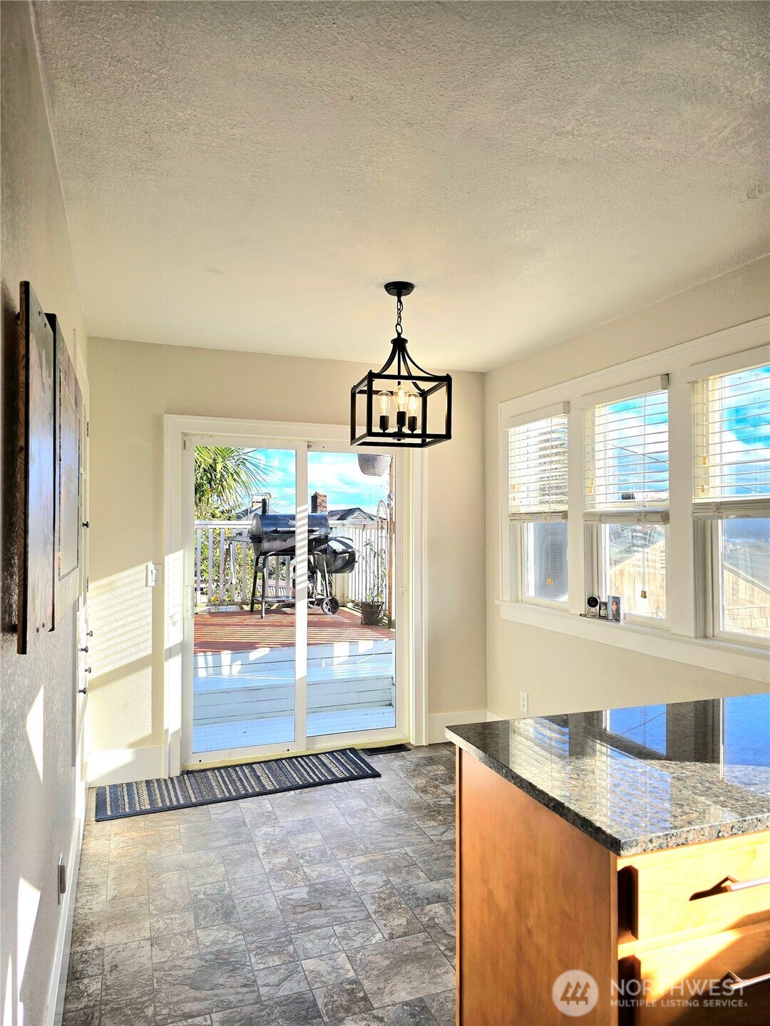 906 North Rice Street Aberdeen, WA 98520 - Photo 12 of 34 a view of a kitchen counter top space and wooden floor