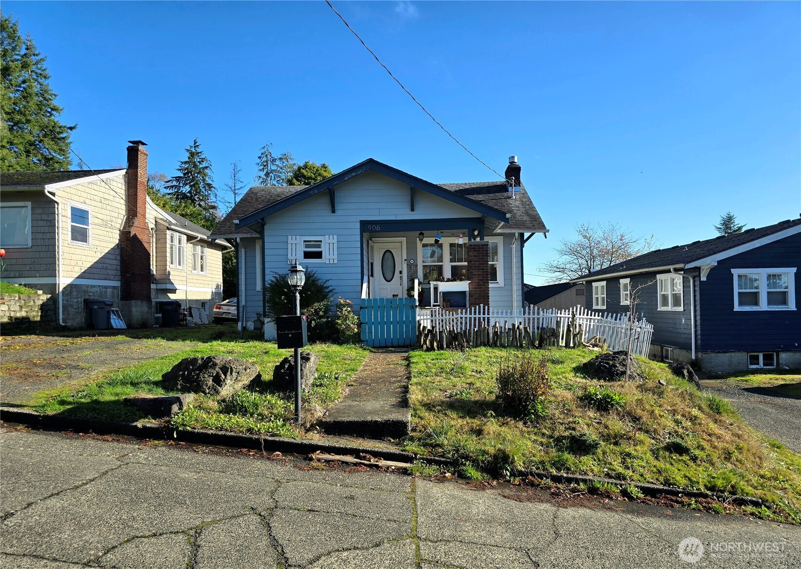 906 North Rice Street Aberdeen, WA 98520 - Photo 33 of 34 a front view of a house with a yard
