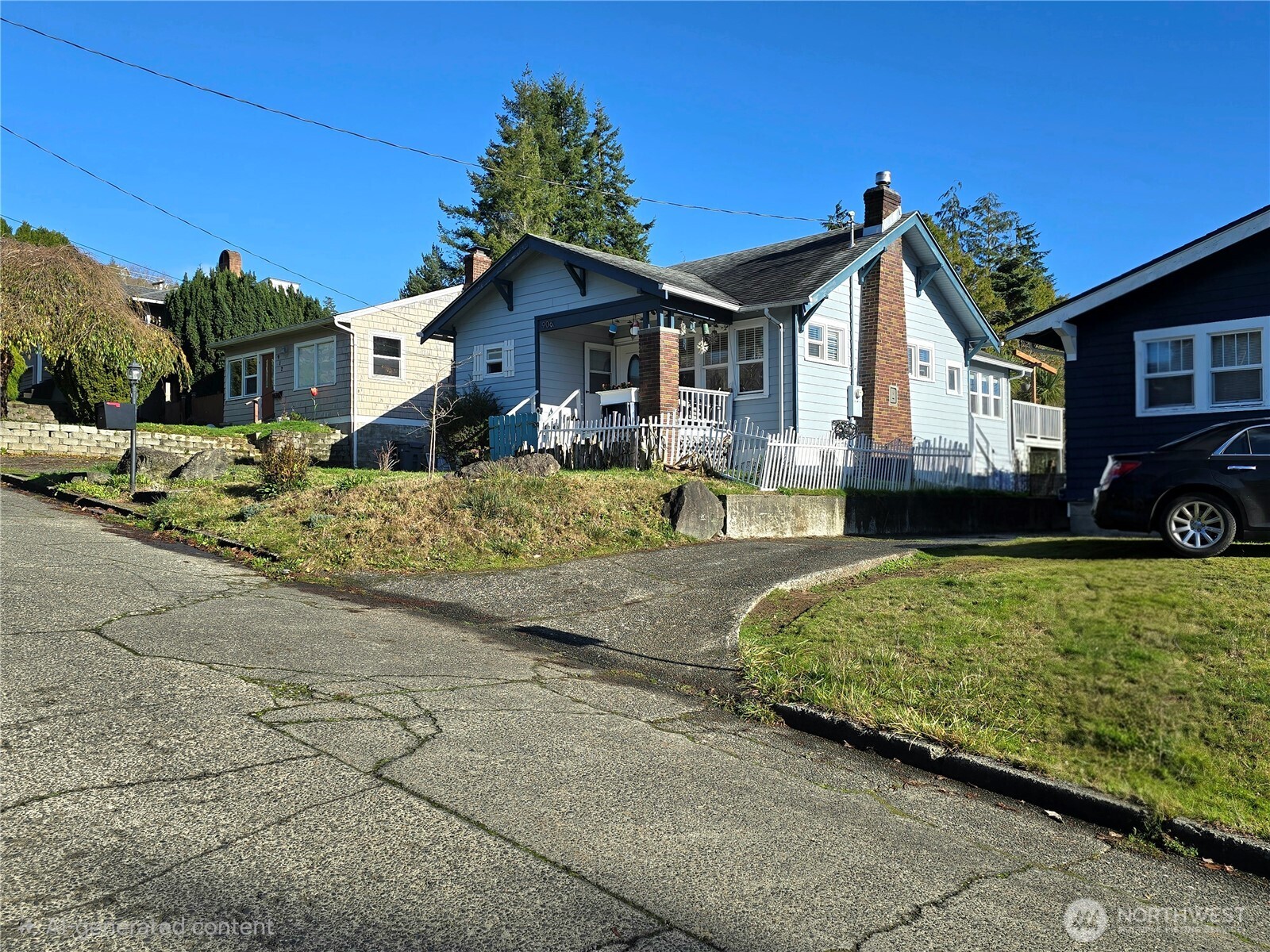 906 North Rice Street Aberdeen, WA 98520 - Photo 4 of 34 a front view of a house with a yard