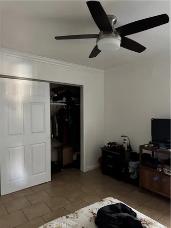 a view of room with workspace and windows