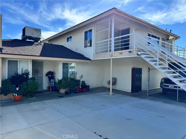 a front view of a house with patio