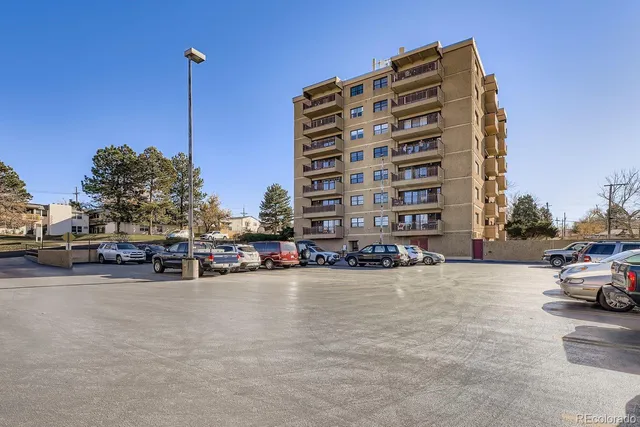 a view of a street with cars