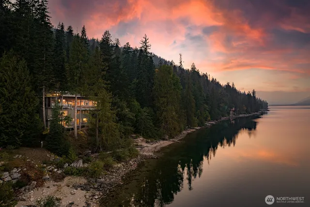 a pathway of a lake and mountain view