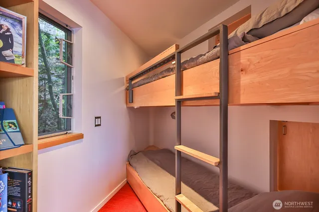 a aerial view of a house with a yard