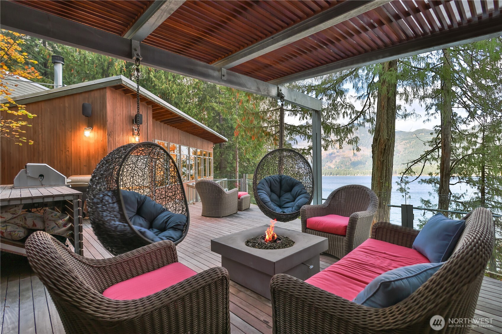 15810 Cedar Brae Road Leavenworth, WA 98826 - Photo 5 of 40 a view of outdoor sitting area with furniture and garden view