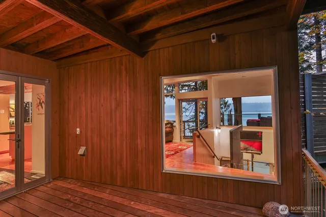 a living room with furniture a fireplace and a table