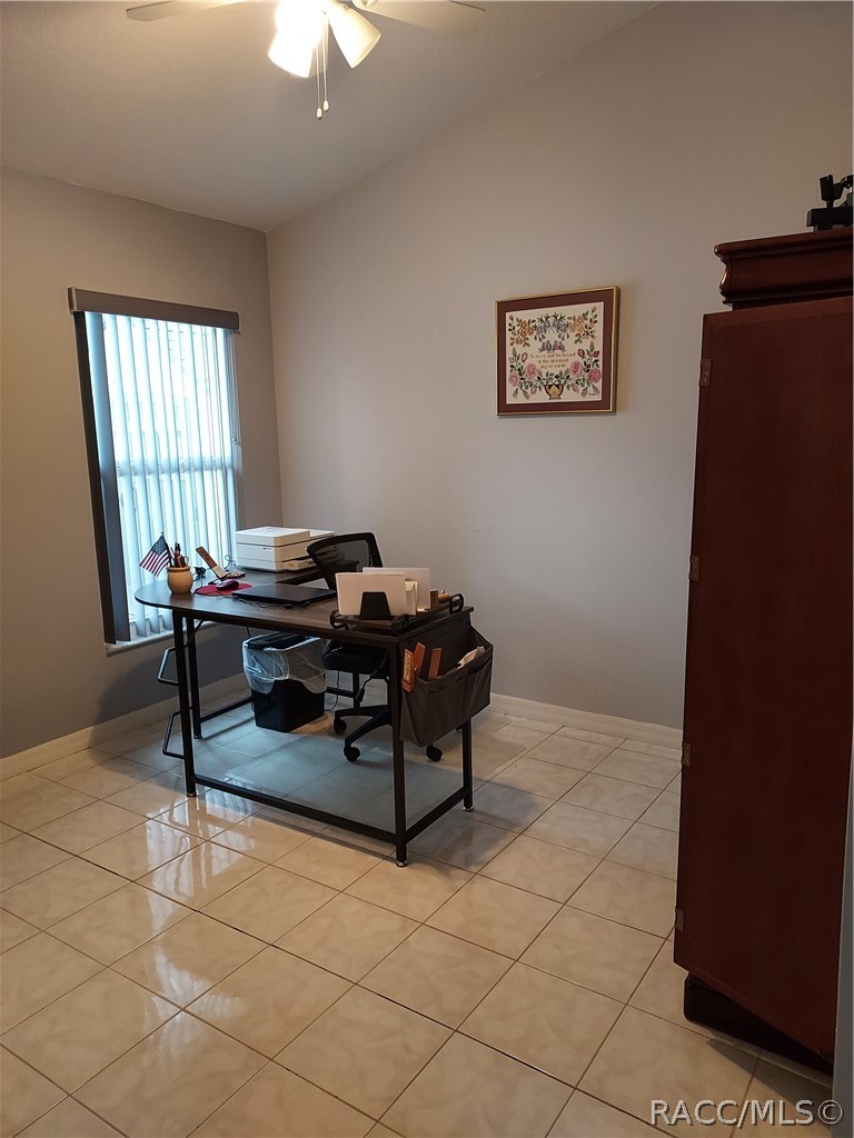 9306 East Gospel Island Road Inverness, FL 34450 - Photo 7 of 16 a living room with furniture and window
