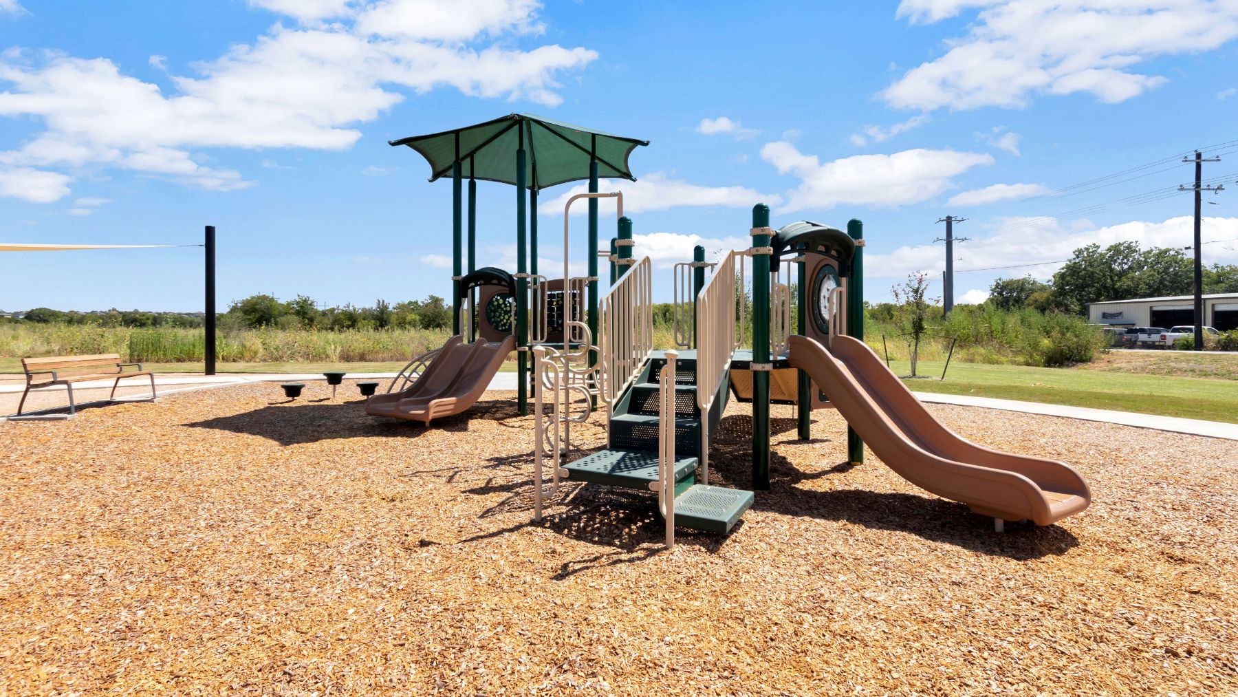 134 Balmorhea Street Kyle, TX 78640 - Photo 4 of 16 a view of a park with slide