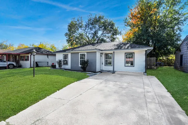 front view of a house and a yard