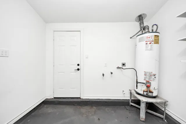 a view of room with wooden floor