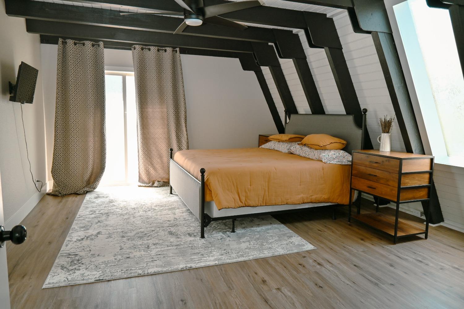 4220 Tomahawk Trail Copperopolis, CA 95228 - Photo 12 of 16 a bedroom with a bed and a window
