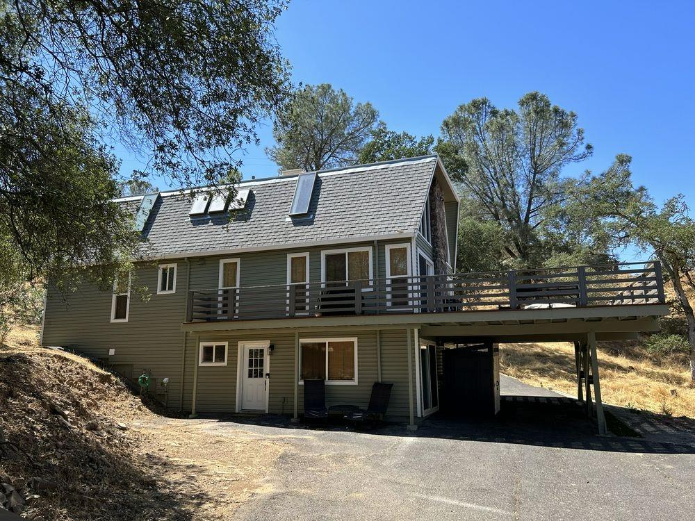 4220 Tomahawk Trail Copperopolis, CA 95228 - Photo 16 of 16 a front view of a house with a yard