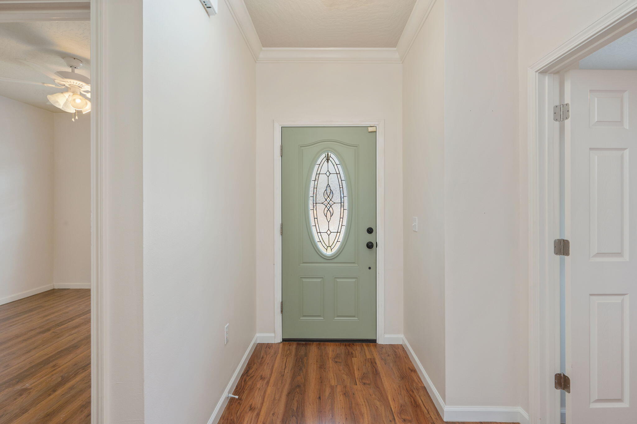 4627 Hermosa Road Crestview, FL 32539 - Photo 8 of 40 a view of hallway with wooden floor
