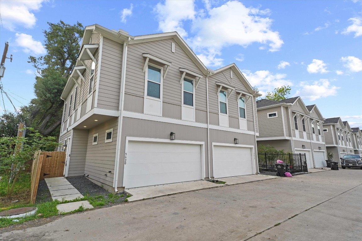 5620 Madison Street Houston, TX 77091 - Photo 1 of 17 a front view of a house with a yard