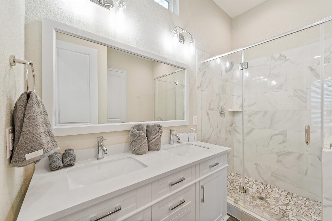 5620 Madison Street Houston, TX 77091 - Photo 10 of 17 a bathroom with a sink and a mirror