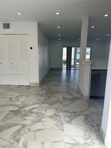 a view of a livingroom with a staircase