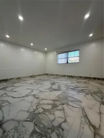 a view of a livingroom with a staircase