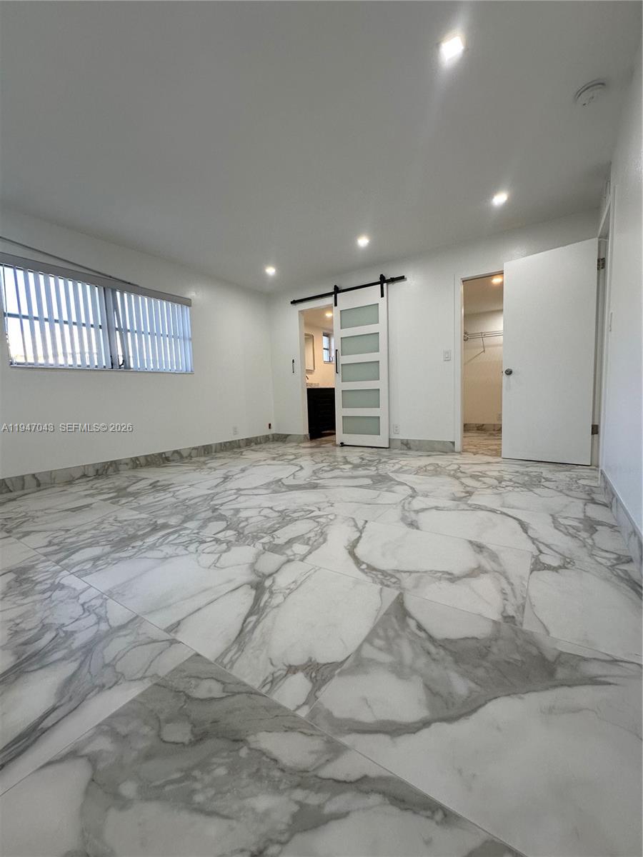4100 North 58th Avenue, Unit 211 Hollywood, FL 33021 - Photo 21 of 47 a view of a livingroom with a staircase