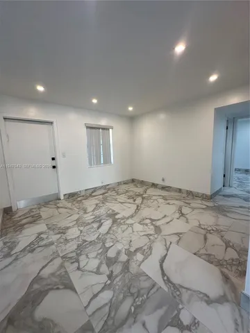 a view of a park with a tree