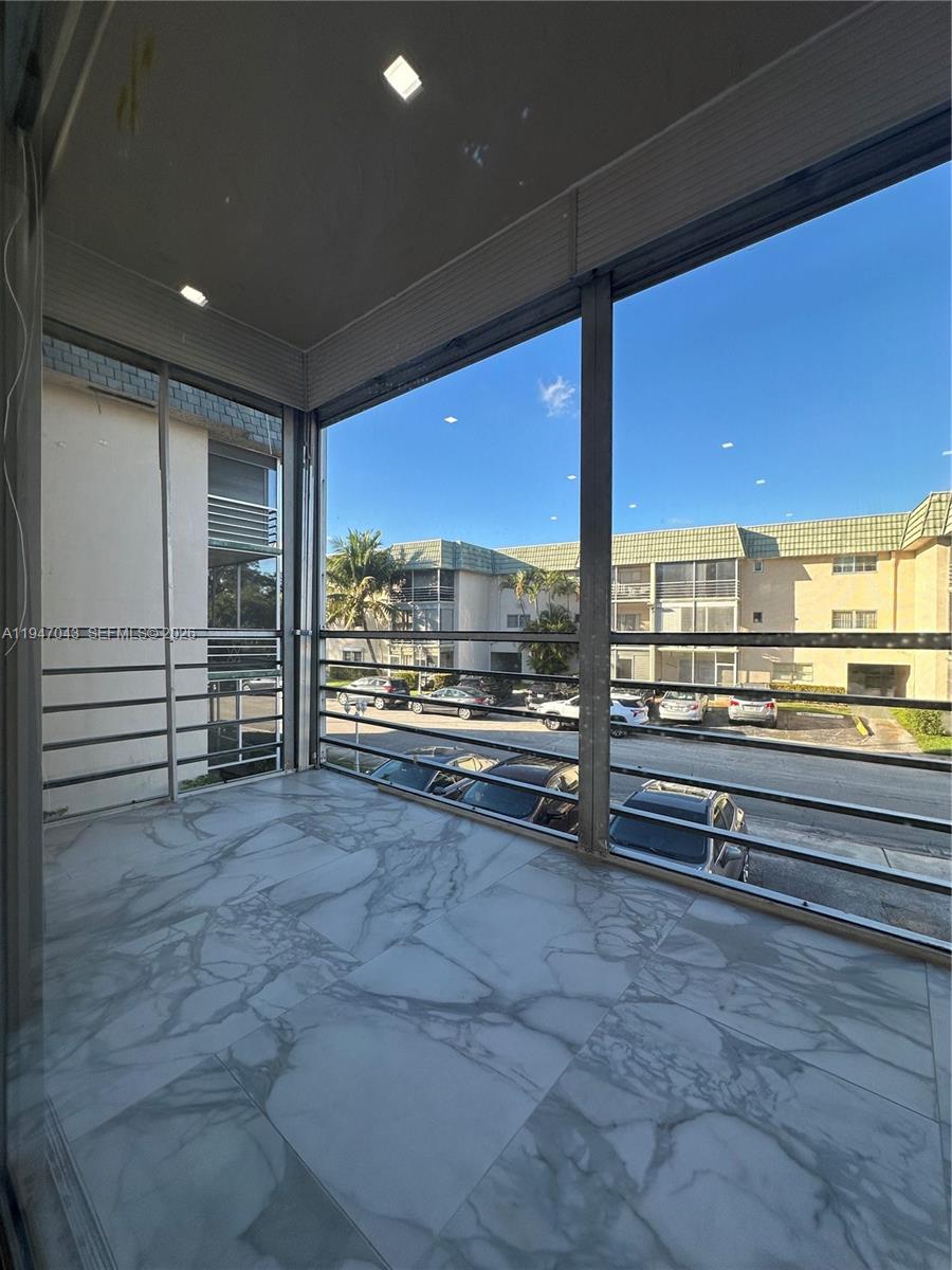 4100 North 58th Avenue, Unit 211 Hollywood, FL 33021 - Photo 37 of 47 a view of outdoor space with seating area