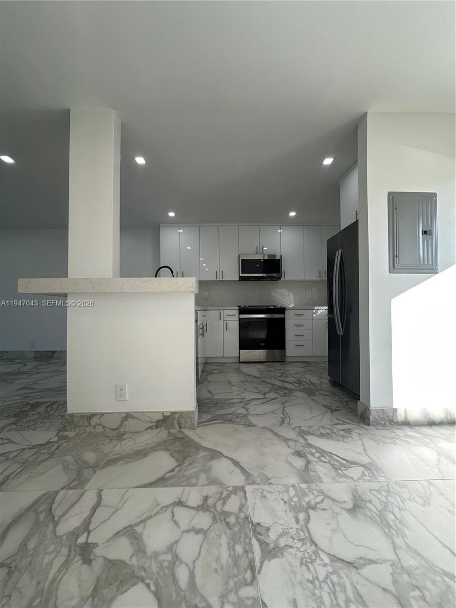 4100 North 58th Avenue, Unit 211 Hollywood, FL 33021 - Photo 4 of 47 a view of a kitchen with a sink