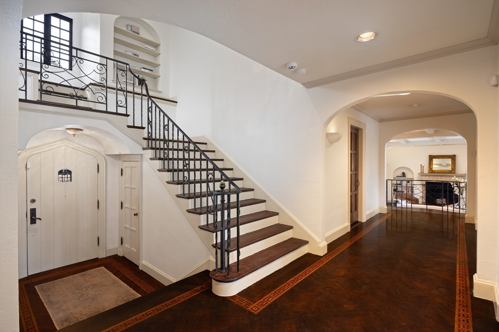 116 Chestnut Hill Road Newton, MA 02467 - Photo 11 of 18 a view of a hallway with entryway wooden floor and windows