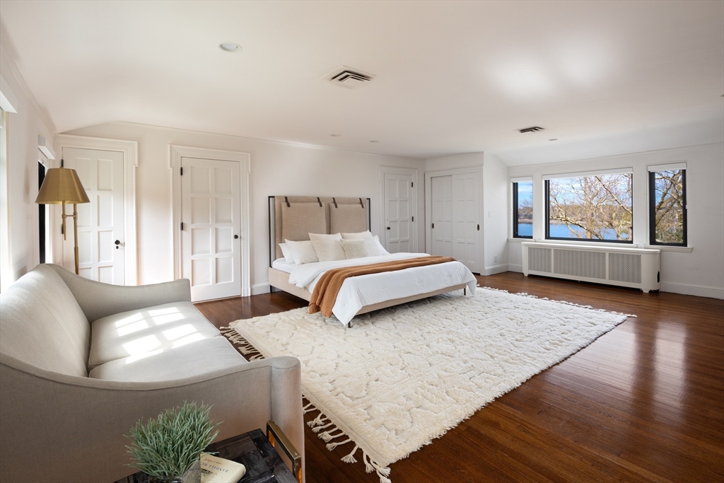 116 Chestnut Hill Road Newton, MA 02467 - Photo 12 of 18 a spacious bedroom with a bed and window