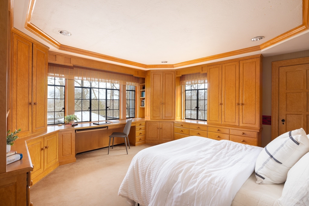 116 Chestnut Hill Road Newton, MA 02467 - Photo 14 of 18 a bedroom with a large bed and a large window