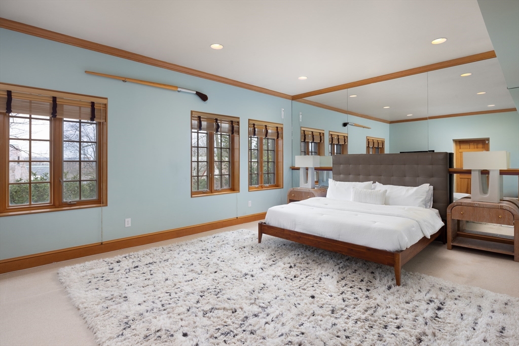116 Chestnut Hill Road Newton, MA 02467 - Photo 15 of 18 a bedroom with a large bed and a window