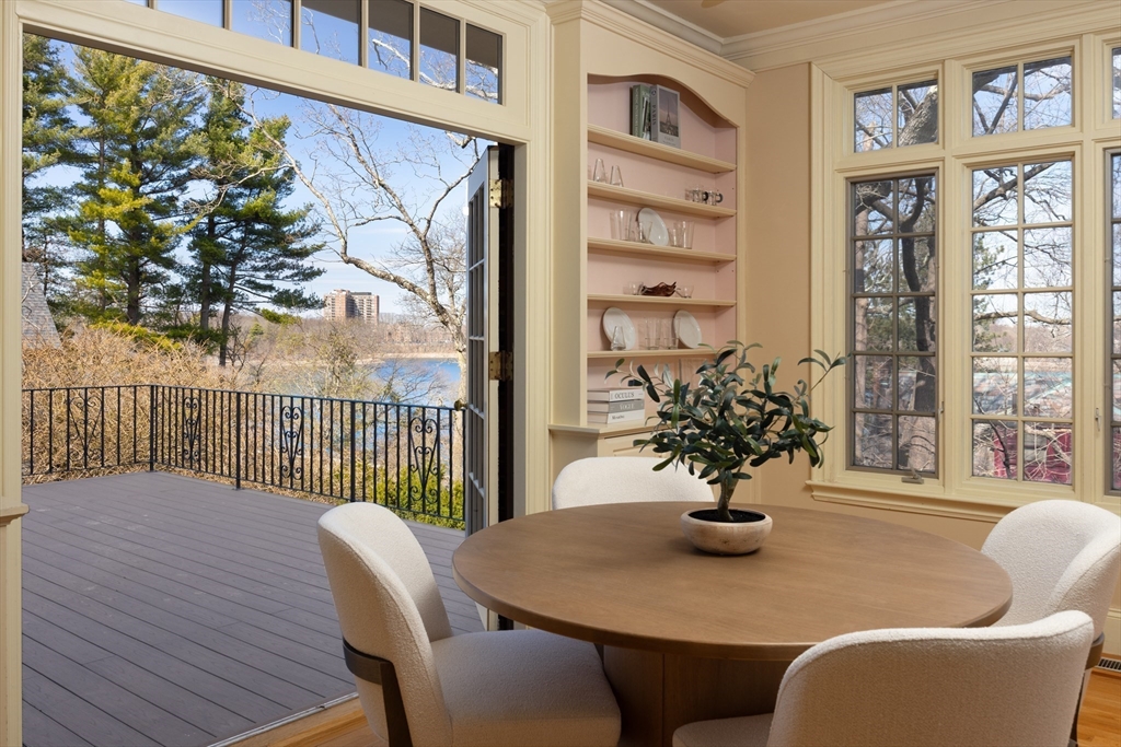 116 Chestnut Hill Road Newton, MA 02467 - Photo 8 of 18 a view of a dining room with furniture window and wooden floor