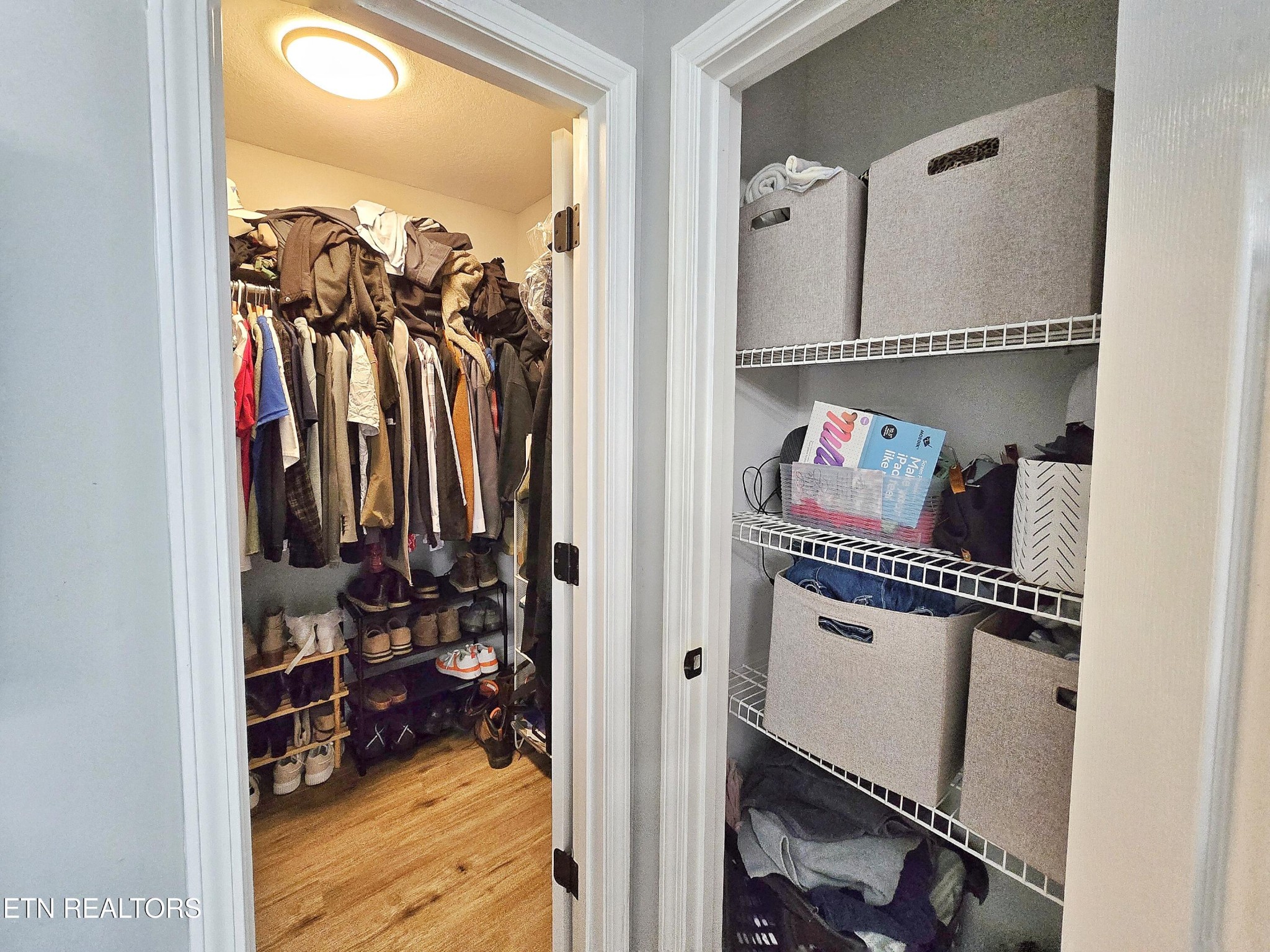 181 Sunset Road Clinton, TN 37716 - Photo 14 of 42 a view of walk in closet with clothes and shoes