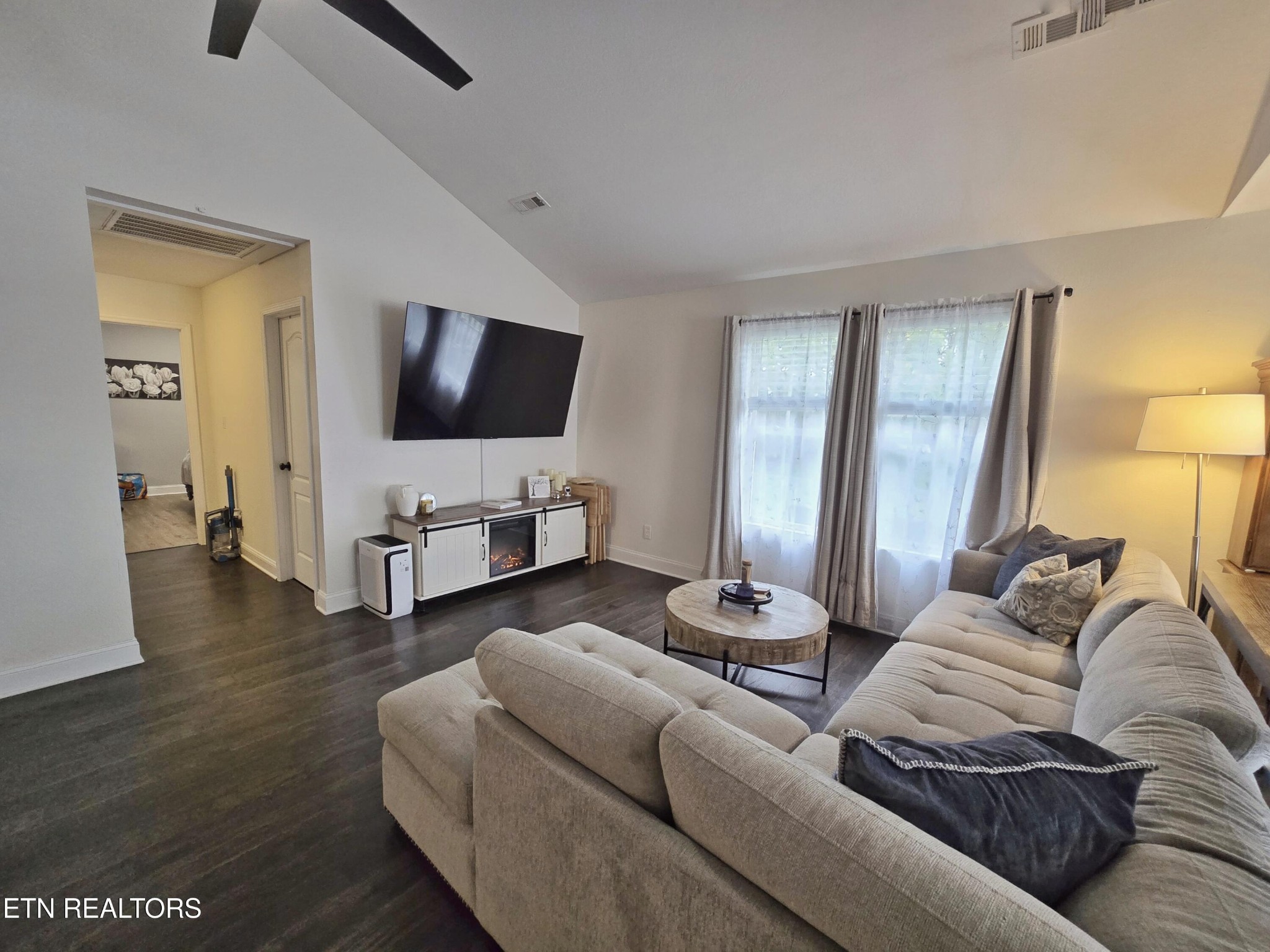181 Sunset Road Clinton, TN 37716 - Photo 17 of 42 a living room with furniture and a flat screen tv