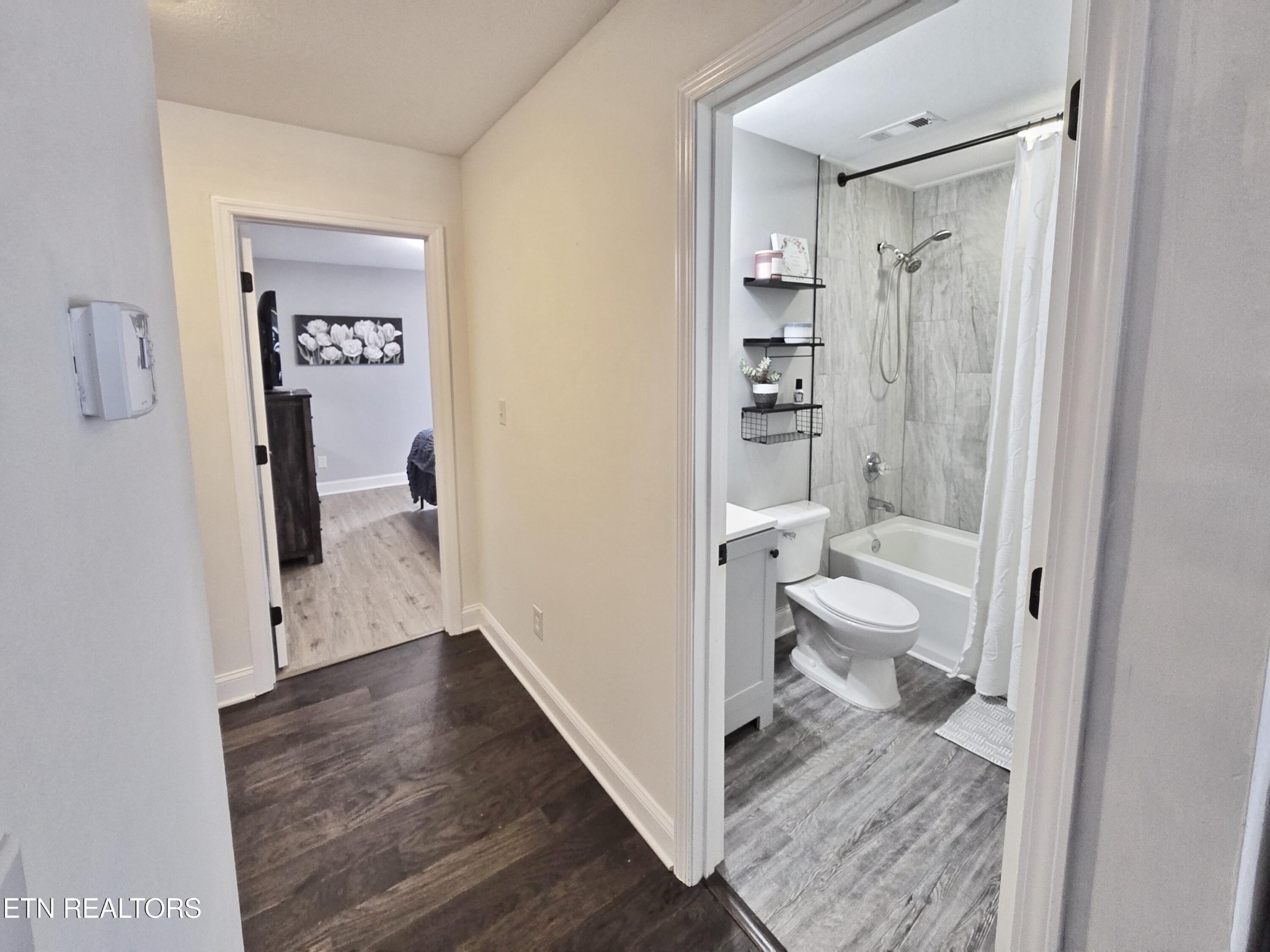 181 Sunset Road Clinton, TN 37716 - Photo 18 of 42 a bathroom with a sink and a toilet