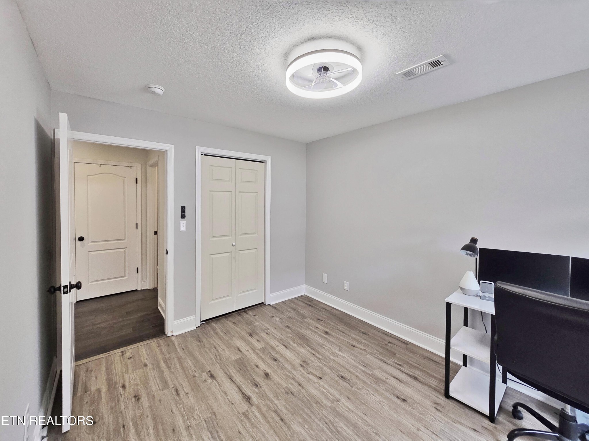 181 Sunset Road Clinton, TN 37716 - Photo 29 of 42 wooden floor in an empty room