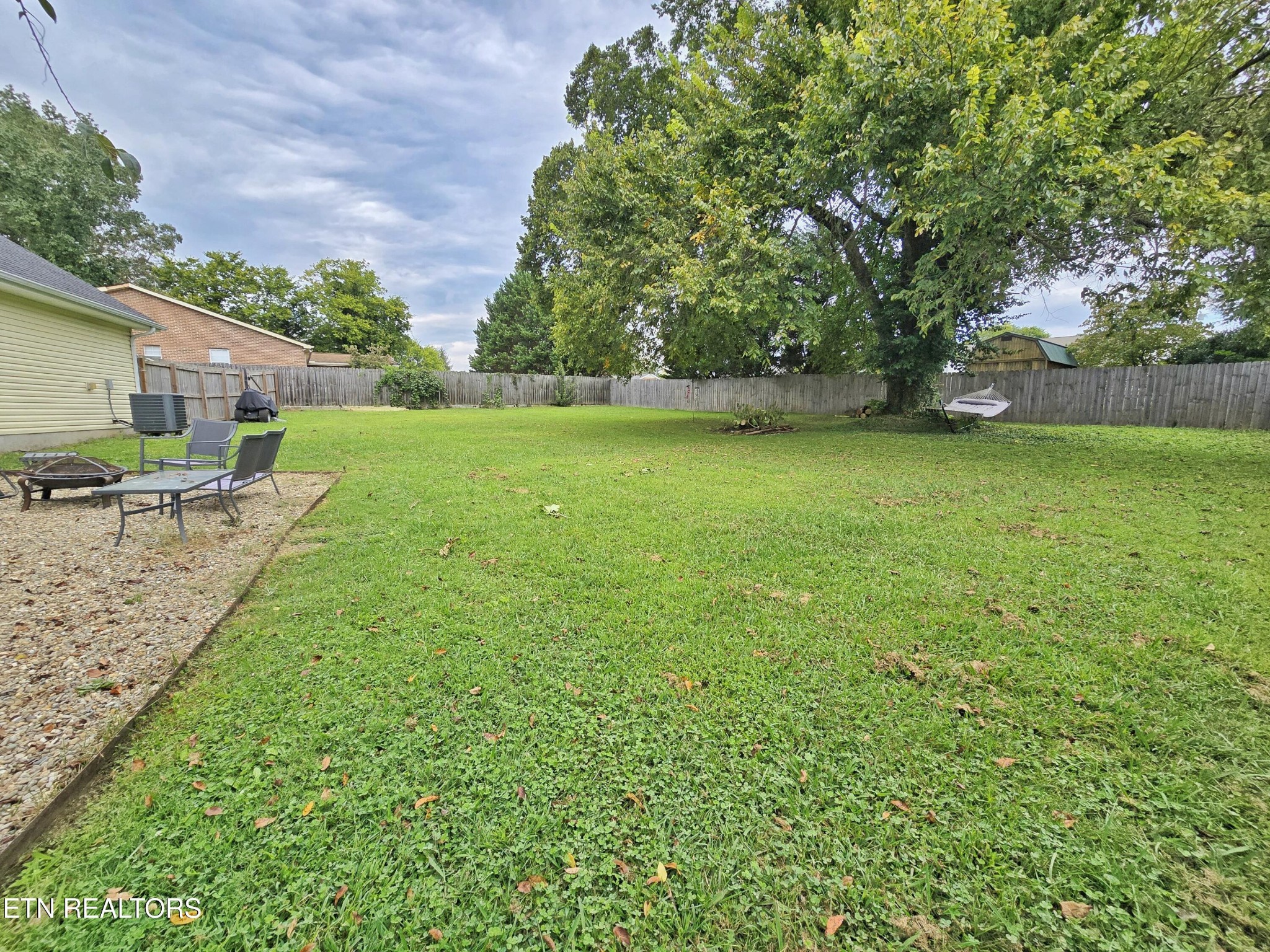 181 Sunset Road Clinton, TN 37716 - Photo 33 of 42 a view of a backyard with a garden