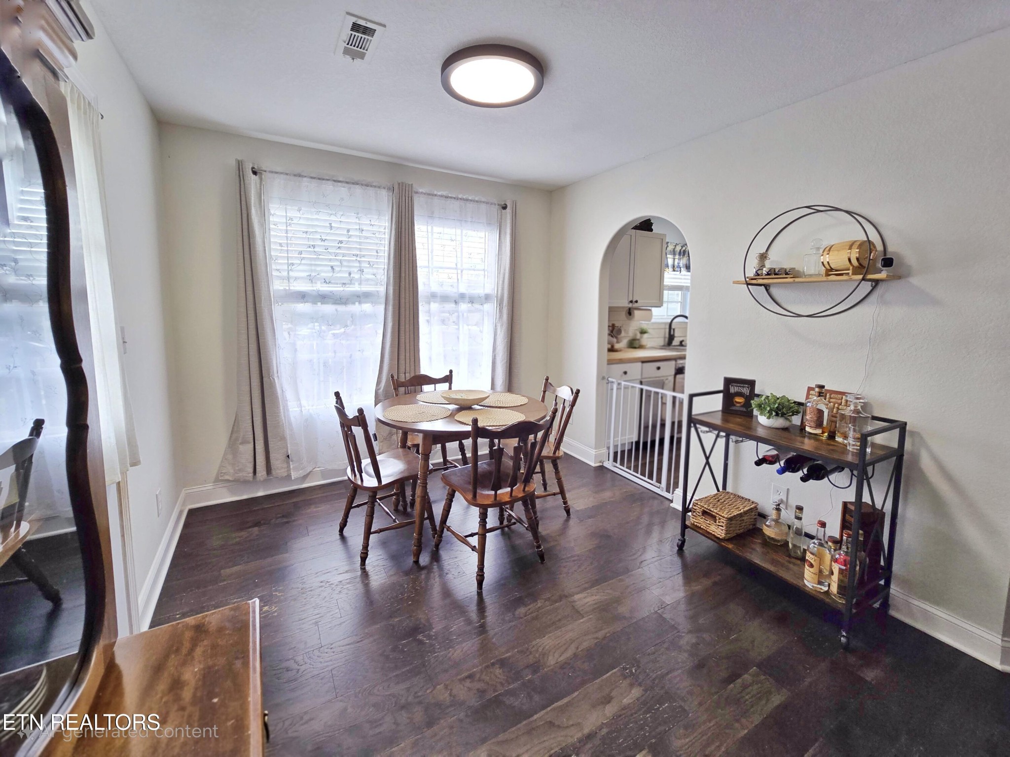 181 Sunset Road Clinton, TN 37716 - Photo 5 of 42 a view of a dining room with furniture window and wooden floor