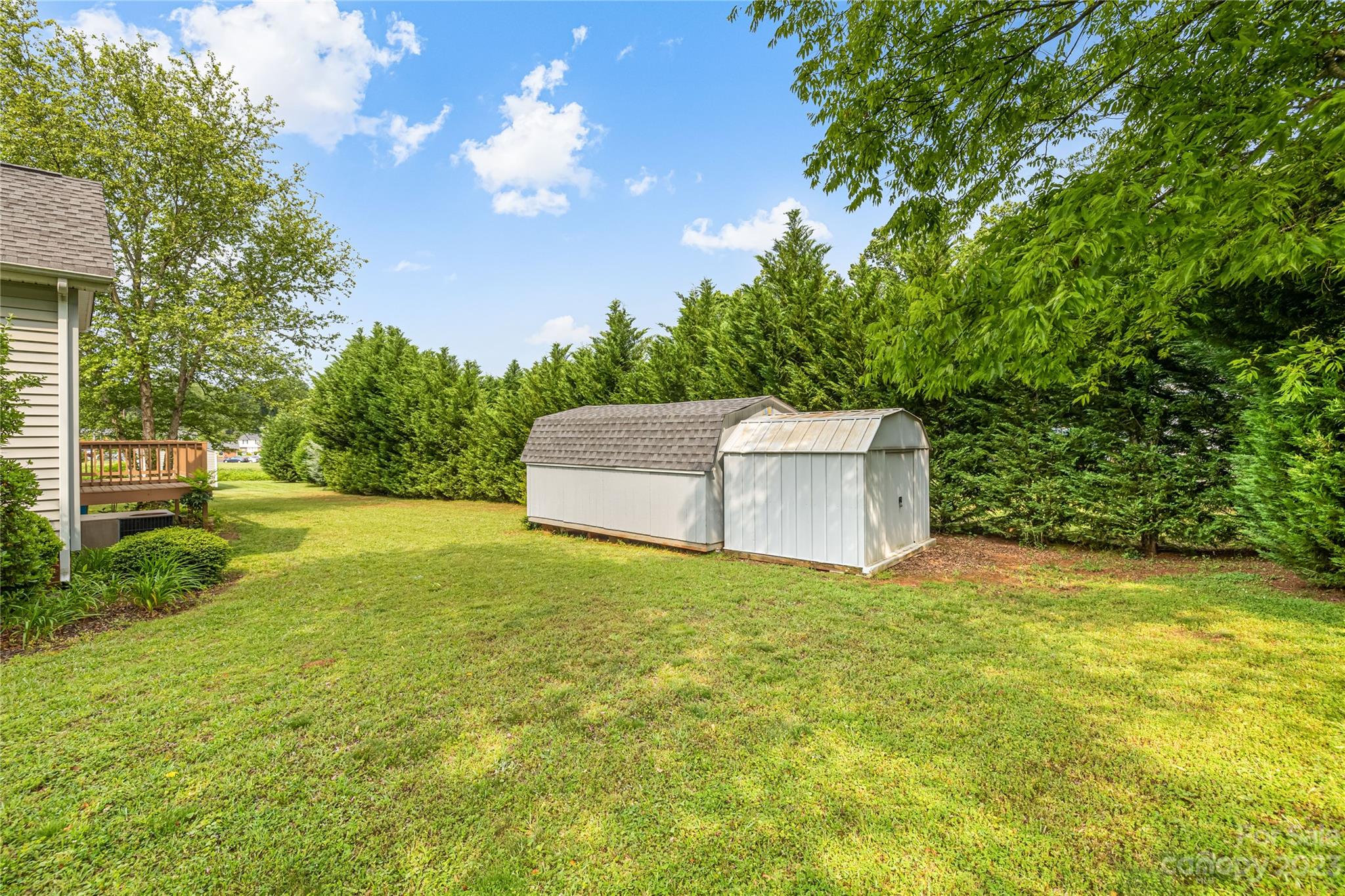 240 Nixon Road Belmont, NC 28012 - Photo 19 of 21 a house with trees in the background