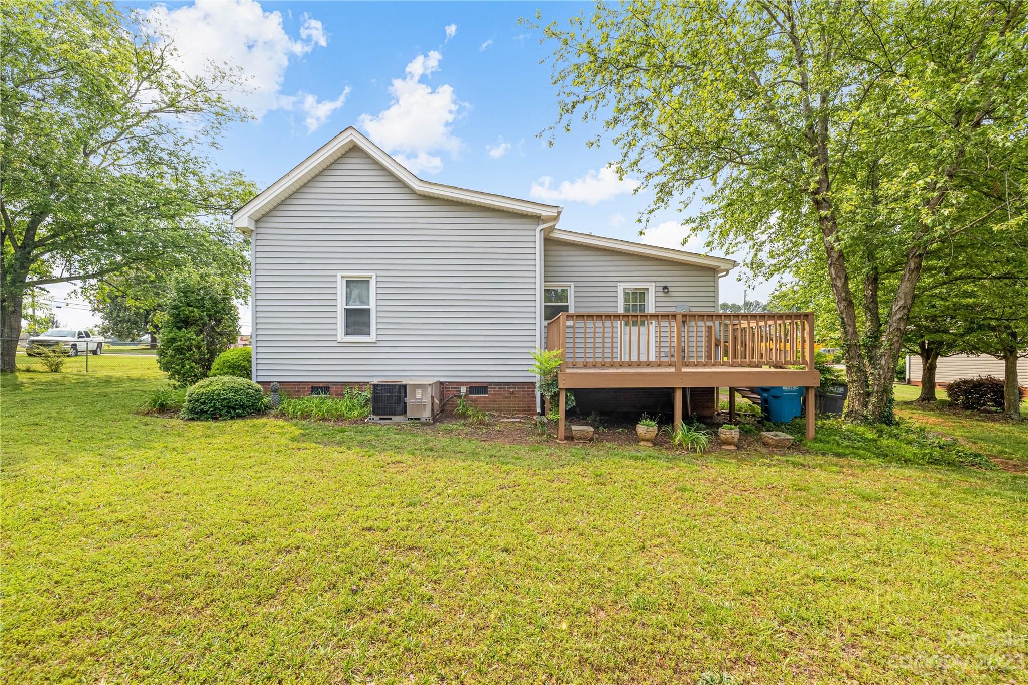 240 Nixon Road Belmont, NC 28012 - Photo 21 of 21 a view of a house with a yard and wooden fence