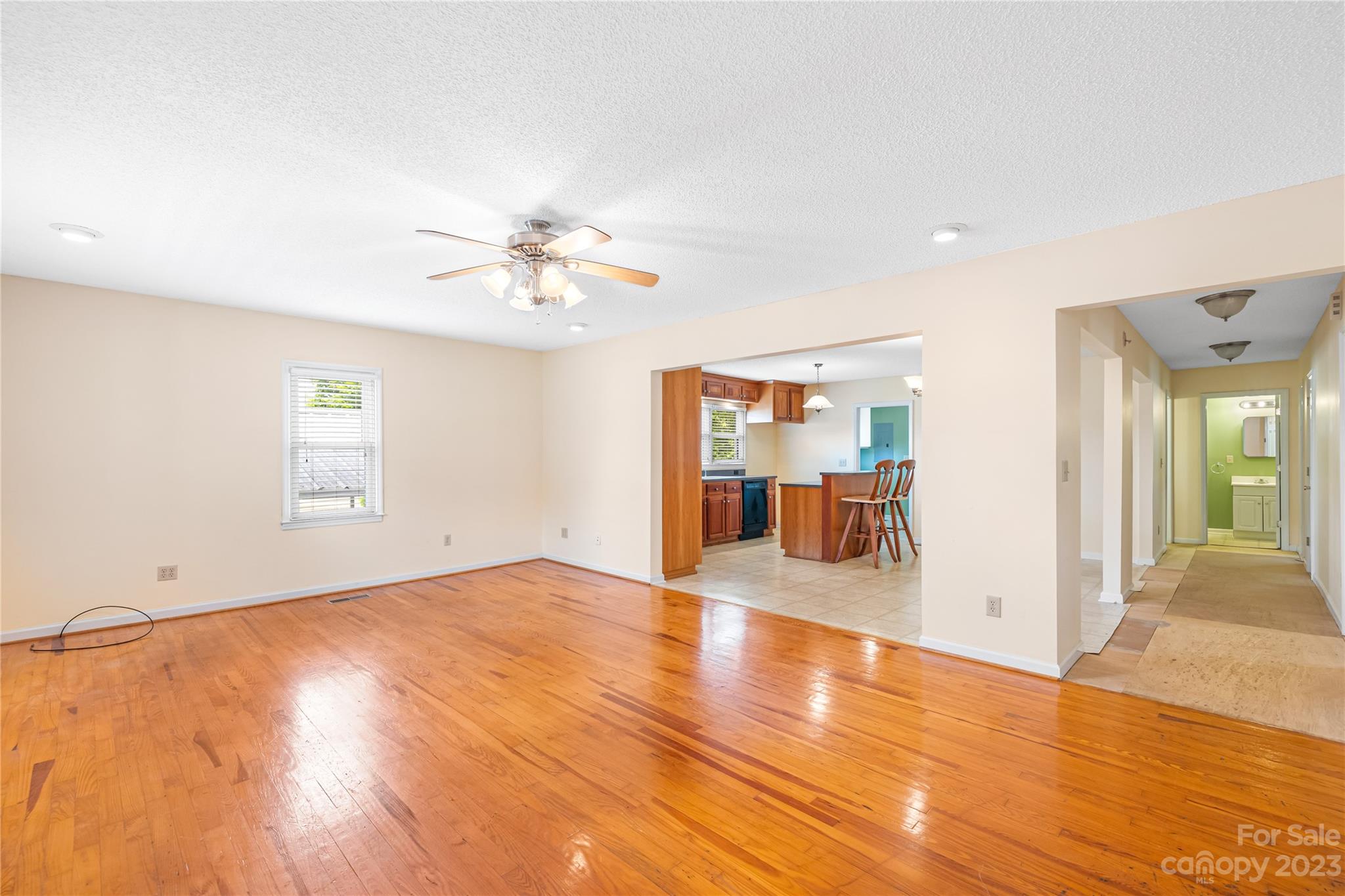 240 Nixon Road Belmont, NC 28012 - Photo 4 of 21 wooden floor in an empty room with a window