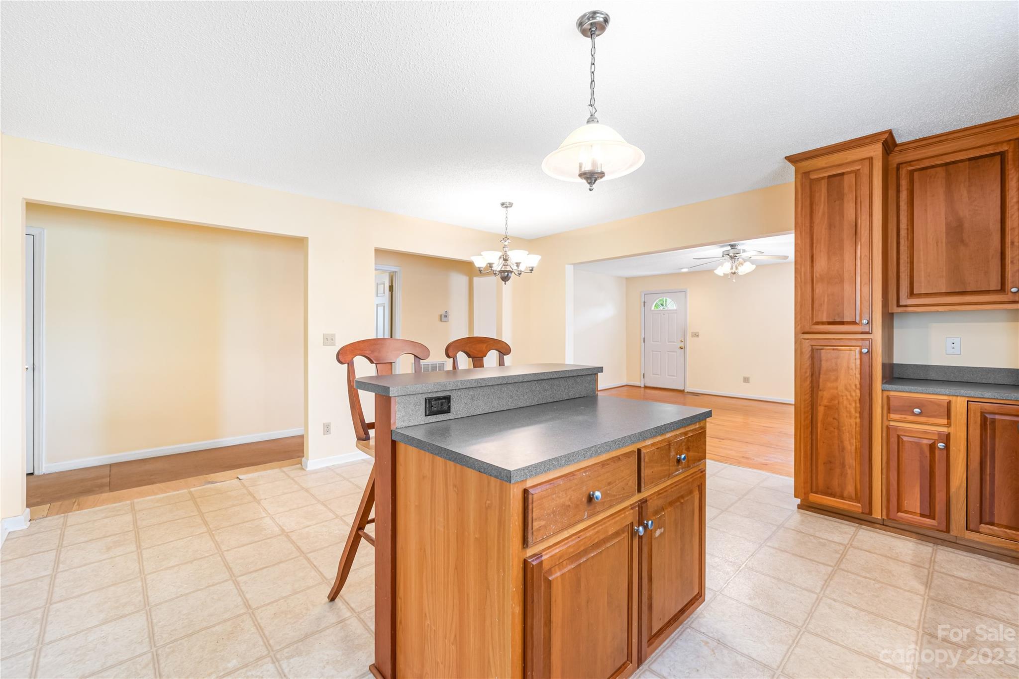 240 Nixon Road Belmont, NC 28012 - Photo 9 of 21 a kitchen with stainless steel appliances granite countertop a sink and a refrigerator
