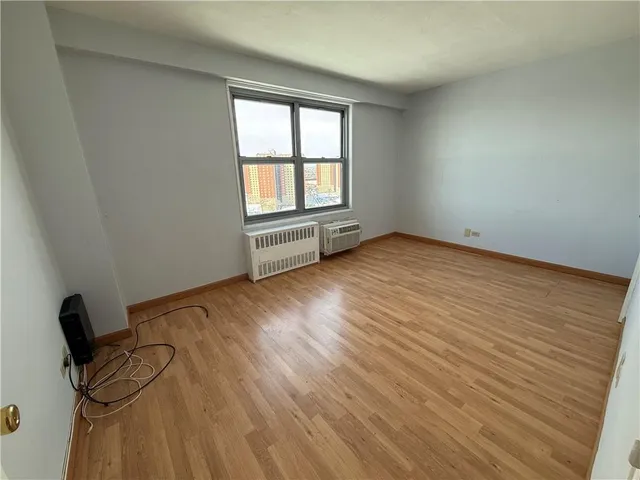 a view of an empty room and window