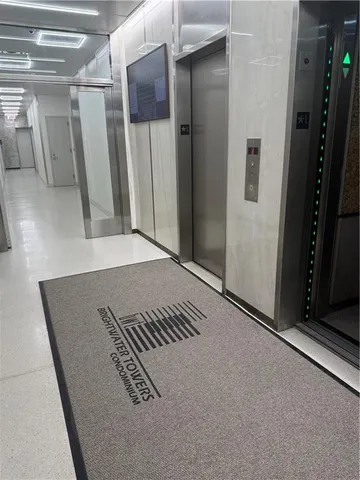 a view of a refrigerator in a room