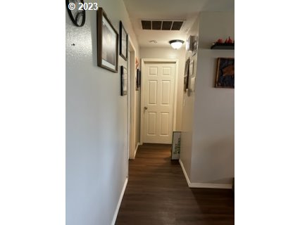 429 Toliver Road Molalla, OR 97038 - Photo 12 of 21 a view of a hallway with wooden floor