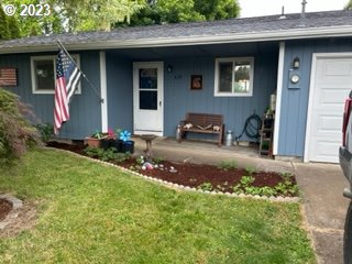 429 Toliver Road Molalla, OR 97038 - Photo 2 of 21 a front view of a house with a yard