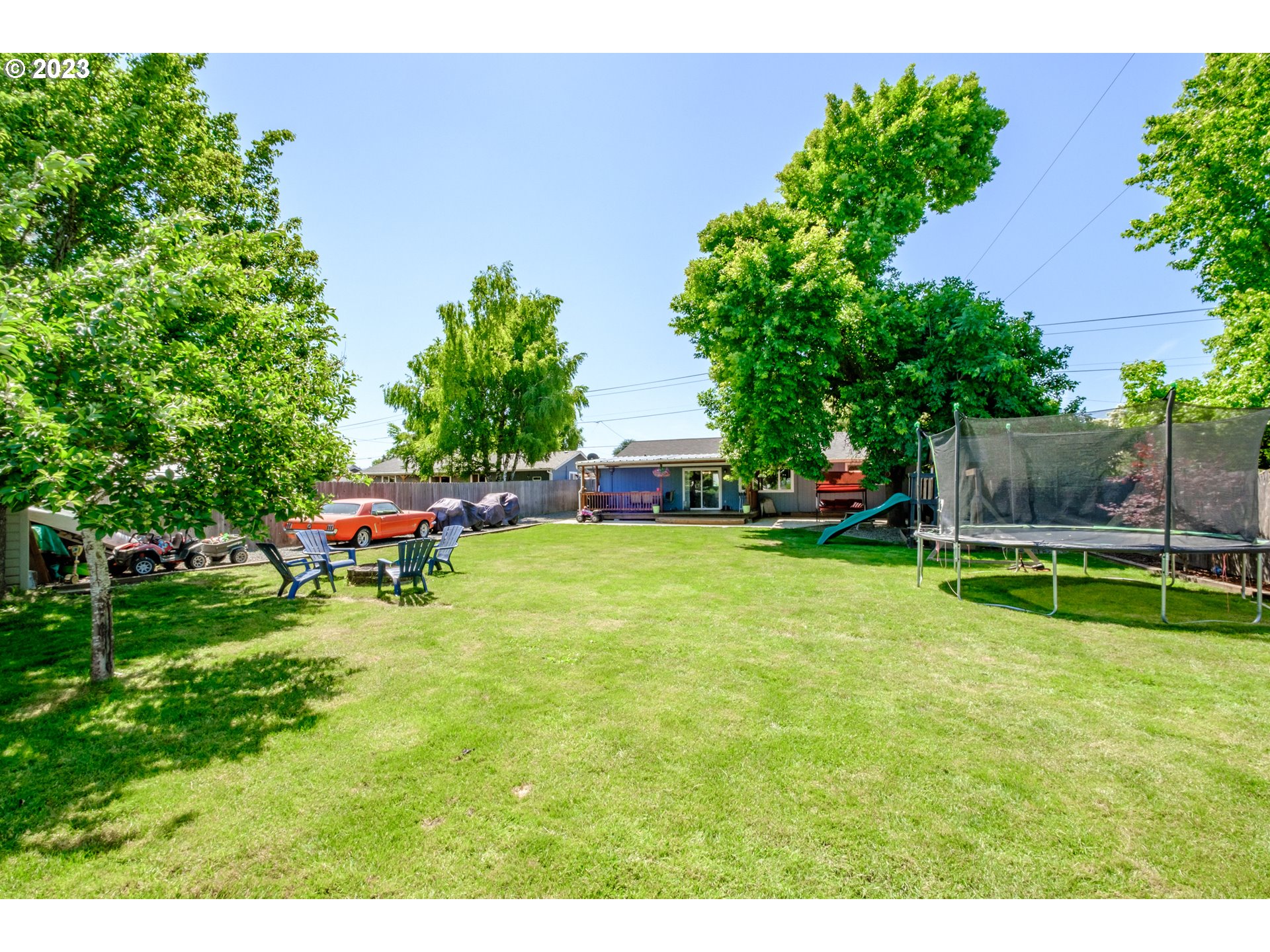 429 Toliver Road Molalla, OR 97038 - Photo 21 of 21 a view of backyard with a garden and entertaining space