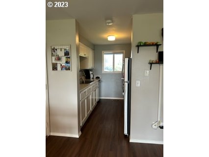 429 Toliver Road Molalla, OR 97038 - Photo 10 of 21 a view of a hallway with wooden floor