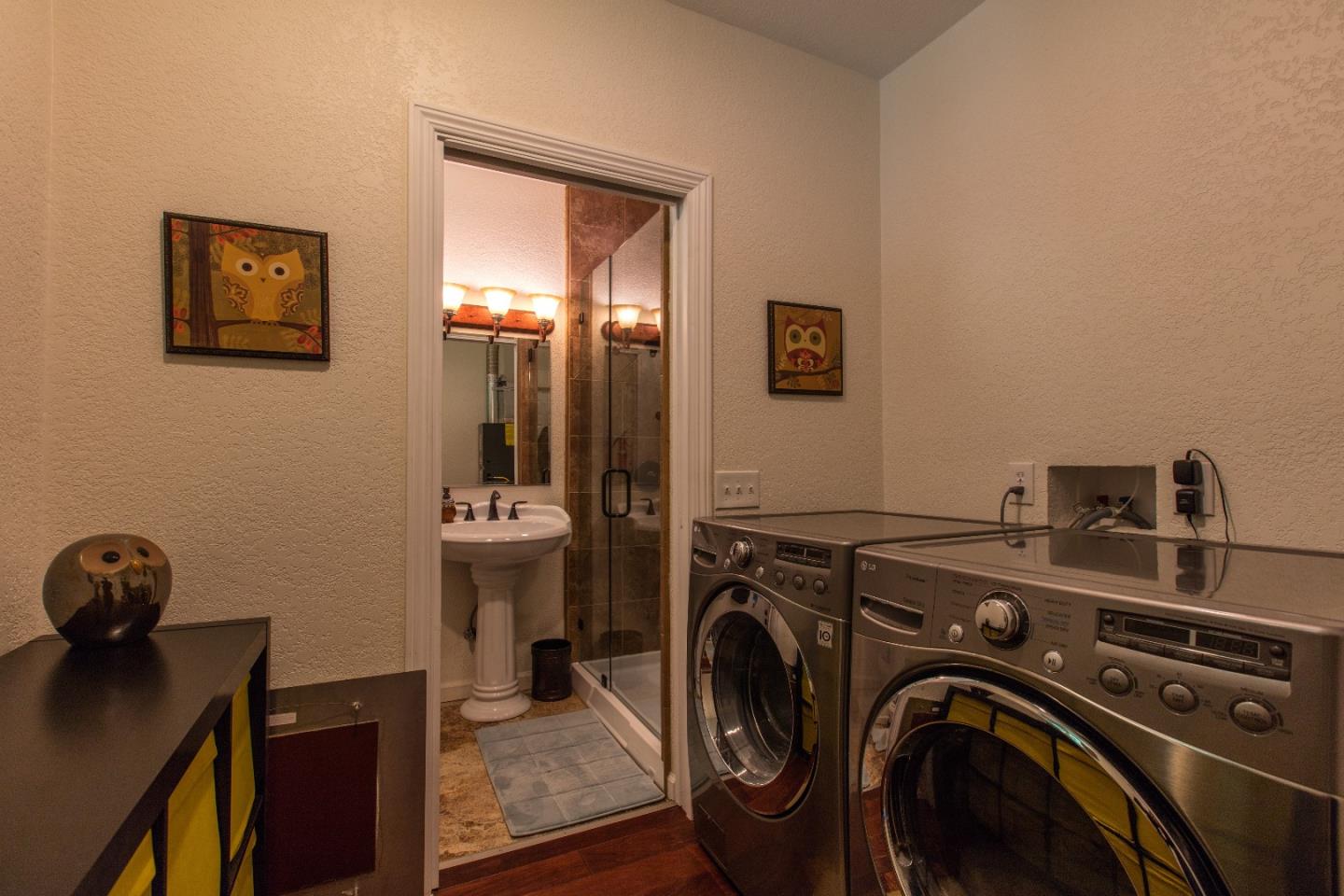21477 Old Mine Road Los Gatos, CA 95033 - Photo 17 of 27 a view of a storage & utility room with a washer dryer