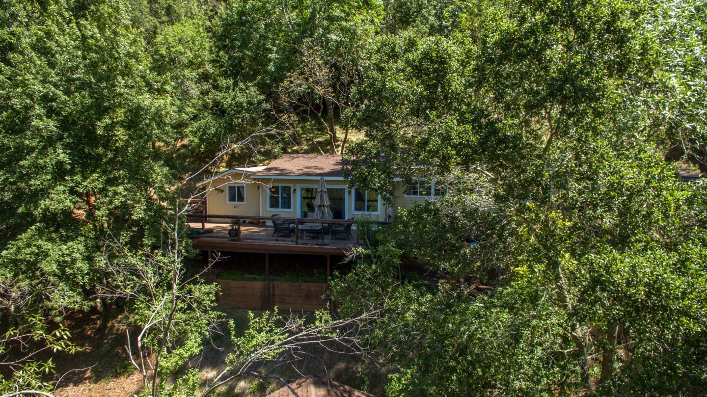 21477 Old Mine Road Los Gatos, CA 95033 - Photo 2 of 27 a roof deck with table and chairs and potted plants